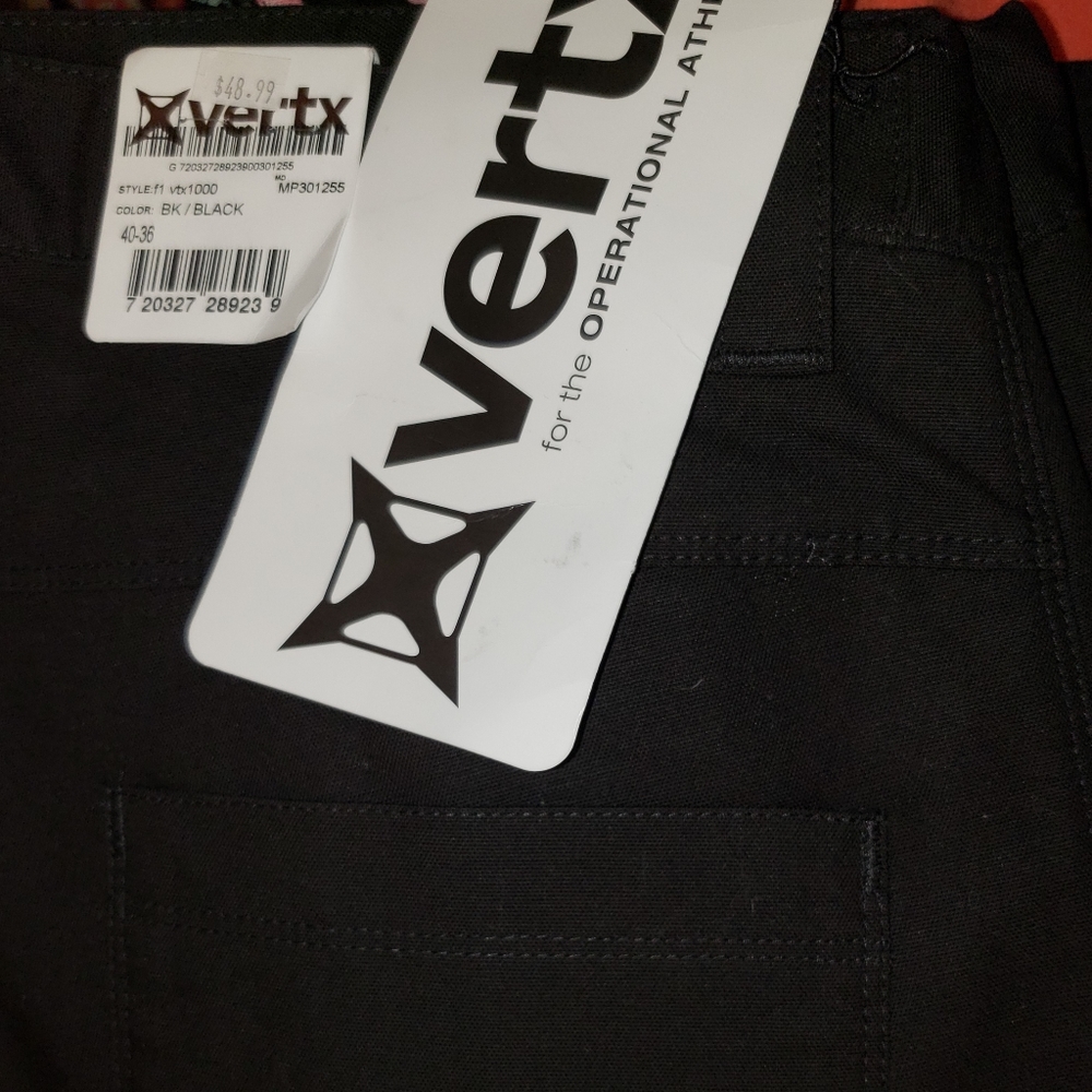 Black VERTX tactical cargo pants. 42"/34"